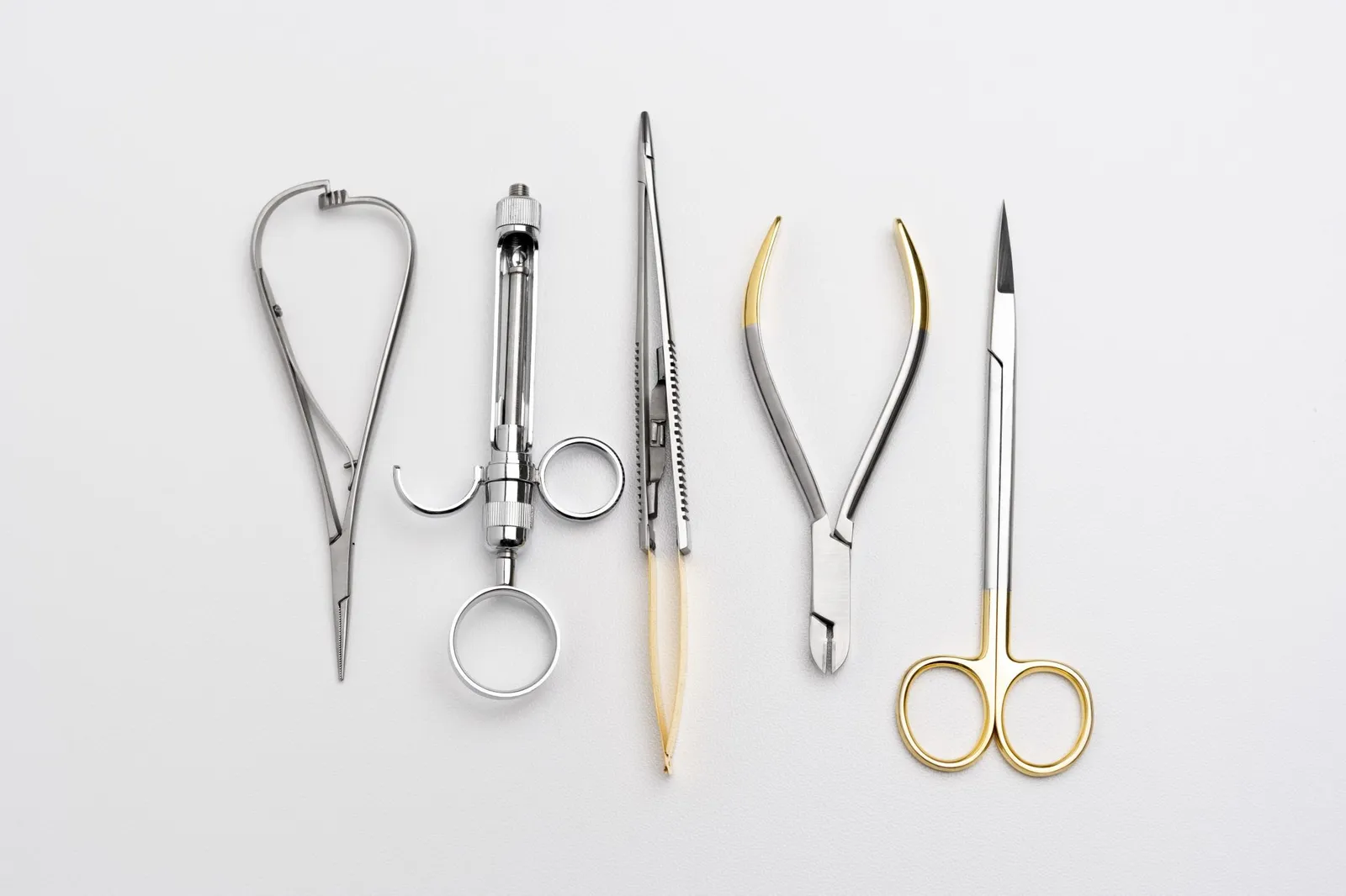 Gold-handled and satin-finish instruments made by Pak Line